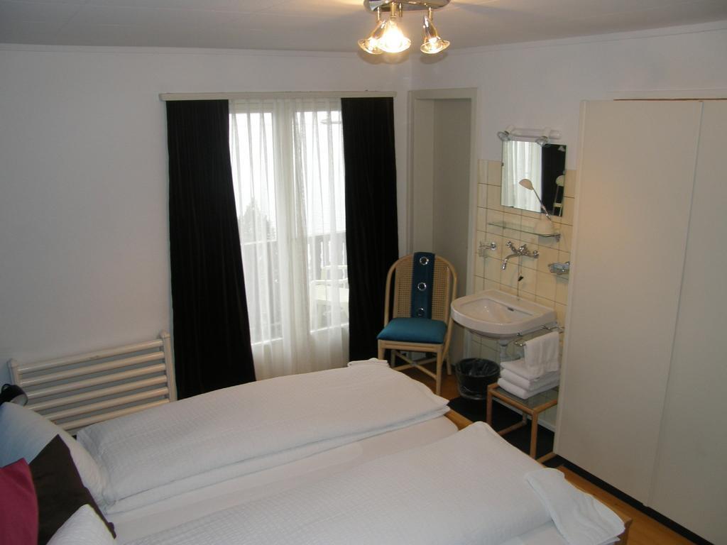Gastehaus Baumgarten Hotel Kehrsiten Habitación foto